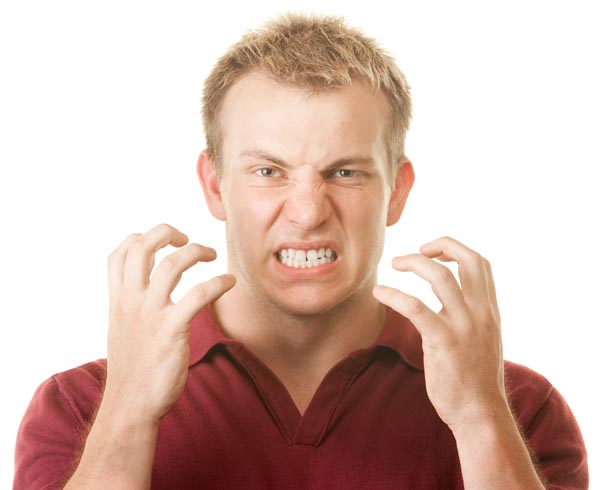 Image of a man grinding his teeth