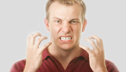 image of a man grinding his teeth